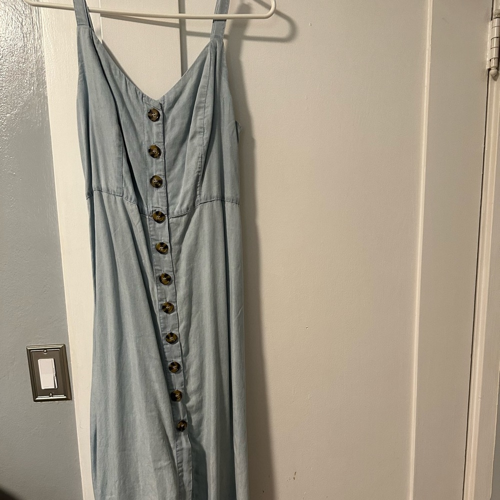 Light jean style dress with buttons and open slit to bottom